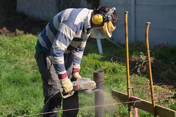 Sciage des pieux maison bois