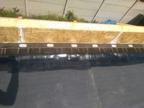 EPDM toit plat maison bois