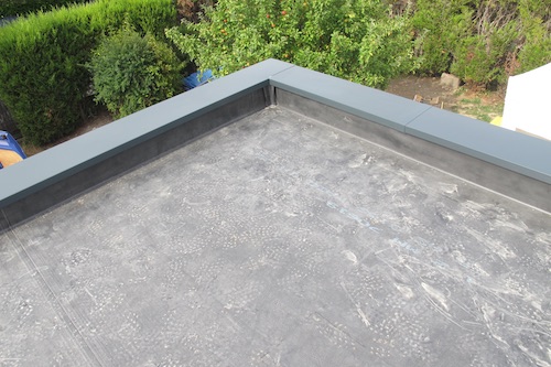 Extension en bois EPDM et couvertine